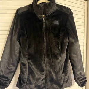 The North Face Women's reversible jacket. Fleece on one side, puffer on other